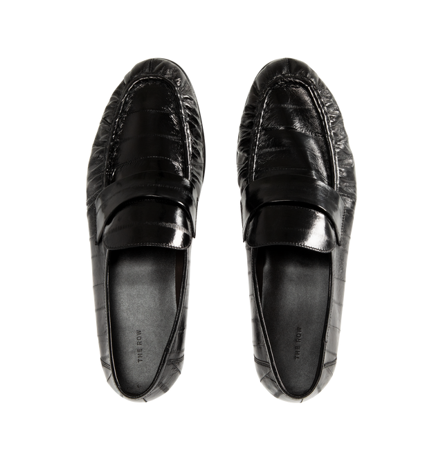 Image 4 of 4 - BLACK - THE ROW Soft Loafer featuring artisanally-crafted loafer in paneled eelskin leather with natural pleating effect and hand-painted leather sole. 0.79 in. heel. 100% eelskin leather. Made in Italy. 