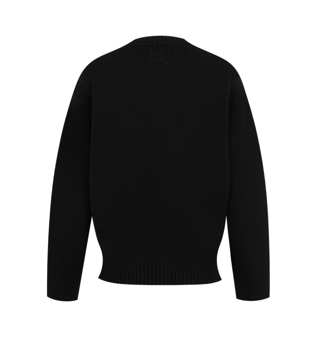 Image 2 of 2 - BLACK - Toteme Women's Oversized Crew Knit Sweater is crafted from cotton knit and features an oversized silhouette, classic crew neckline, and ribbed trim at the neckline, cuffs, and hem. This designer cotton sweater combines a relaxed fit with timeless knitwear styling for elevated everyday layering. Main Material: 100% Cotton.  