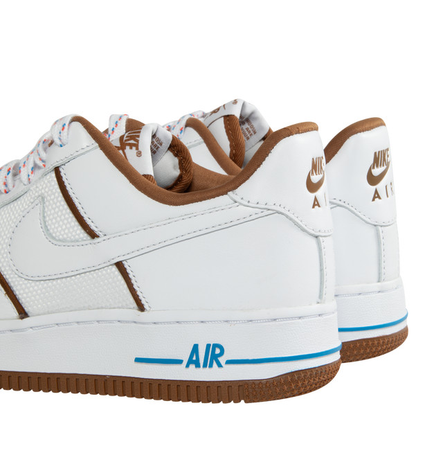 Image 3 of 5 - WHITE - NIKE AIR FORCE 1 07 LX features low-cut, padded collar and rubber outsole with heritage hoops pivot with foam in the midsole and perforations on the toe. 