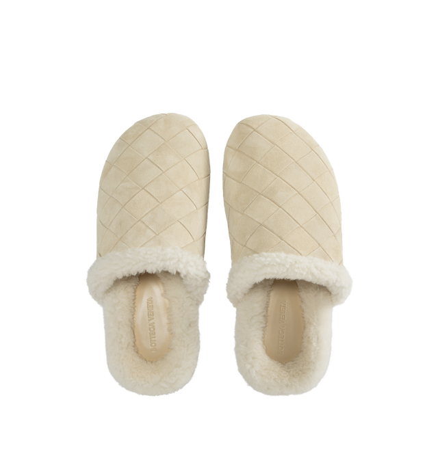 Image 4 of 4 - WHITE - BOTTEGA VENETA Reggie Slipper featuring covered front and open heel, crosshatch pattern, suede upper, lined with plush fur and rubber sole. 