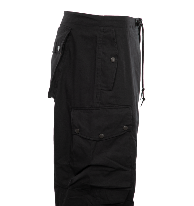 Image 3 of 4 - BLACK - NEEDLES Field Pants featuring drawcord waist and hem, flapped pockets, darting along the knee and five pockets. 100% cotton. Made in Japan. 