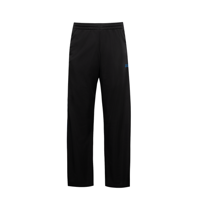 Image 1 of 3 - BLACK - MARTINE ROSE Wide Leg Track Pant in black with contrasting blue, white and grey panel details. Featuring embroidered Martine Rose logo at the front, an elasticated waistband and 2 side pockets. 100% polyester. Unisex style in Men's sizing.  