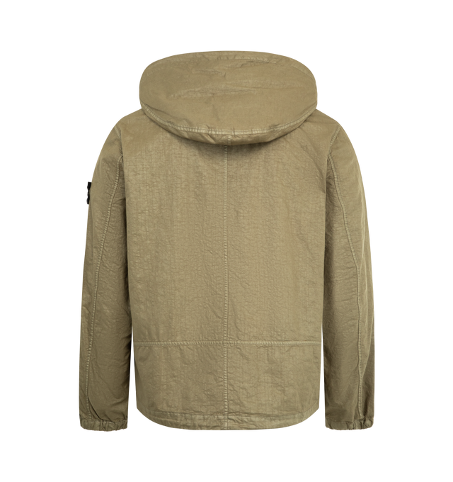 Image 2 of 3 - BROWN - STONE ISLAND Hooded Jacket featuring lined hood with fixed elasticated drawcord, front yoke, angled hand pockets with concealed zipper, Stone Island badge on left sleeve, elasticated cuffs, drawcord with stoppers at bottom hem and high-neck two-way zipper fastening. 100% polyamide/nylon. 