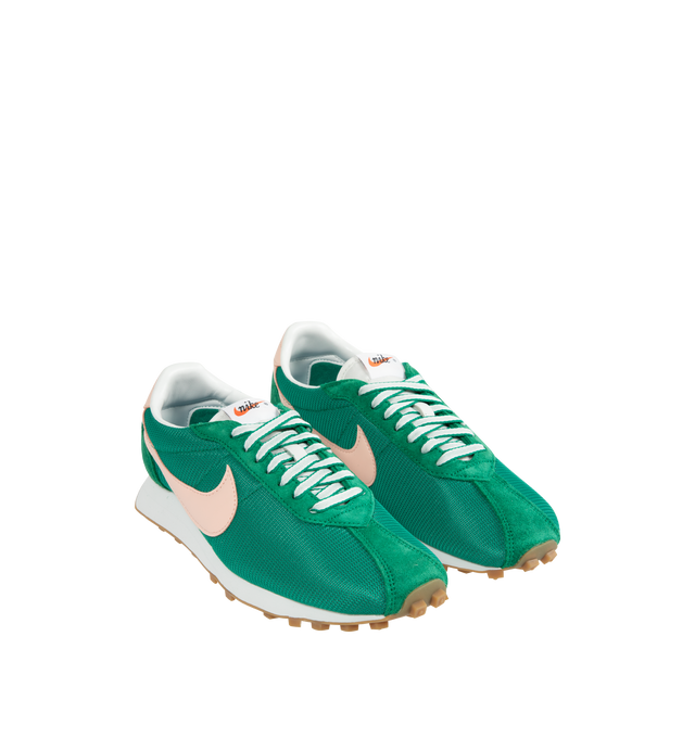 Image 2 of 5 - GREEN - NIKE LD-1000 Sneaker featuring a dramatically flared heel, an upper that combines leather and textiles for a durable, breathable fit and waffle outsole that provides the old-school look. 