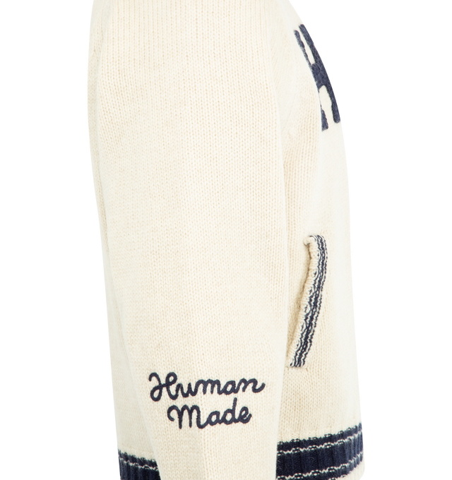 Image 3 of 3 - WHITE - HUMAN MADE Zip-Up Knit Jacket featuring warm, mid-gauge wool knit, polyester lining with heart-shaped quilting, H crocheted on the right chest, heart motif in chenille embroidery on the left chest, brand message expressed in chain stitching, knitted lines add character to the design and two front pockets. 100% wool.  
