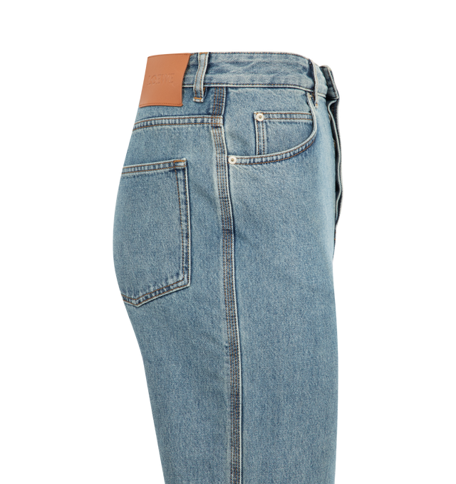 Image 3 of 3 - BLUE - Loewe men's jeans in medium-weight washed cotton denim featuring contrast Anagram cut-outs at the knees?. Relaxed fit, regular length with mid waist, loose leg, concealed button fly?, five pocket style and ?LOEWE embossed leather patch placed at the back. Made in Italy. 