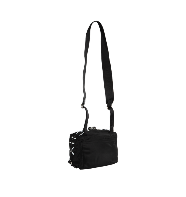 BLACK - GIVENCHY Small Pandora Bag featuring metal zipped closure with leather zipper pulls and wide opening, adjustable shoulder strap, contrasting GIVENCHY signatures on the top and on the shoulder strap, metal buckles, silvery-finish metal details, one main large zipped compartment with one zipped flat inside pocket and one flat pocket on the back. Adjustable strap length from 10.6 to 26.8 in. Canvas lining. 8.27 in x 7.48 in x 5.51 in. 90% polyamide, 10% acrylic. Lining: 100% polyamide. 100% calfskin le