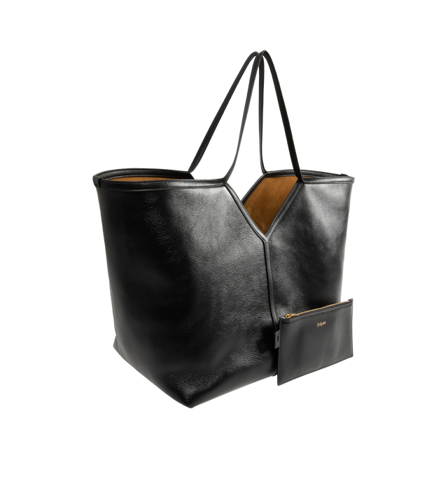 Image 2 of 3 - BLACK - SAINT LAURENT Y Slim Tote Bag featuring finely grained calfskin leather, bronze-tone hardware, stitched Y signature, dual top handles; 10.8" drop, open top and interior, one zip pocket and one keyring carabiner tab. 23.6"W x 13.4"H x 7.5"D. Made in Italy. 