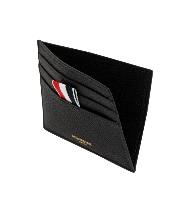 Image 3 of 3 - BLACK - THOM BROWNE Soft Pebble Grain Card Holder featuring single card holder in soft pebble grain leather with note compartment, 3 card slots on both sides, gold foil printed logo at face and signature striped grosgrain loop tabs at face. L 10 x W 2 x H 8 cm. 100% calf full grain leather. Made in Italy. 