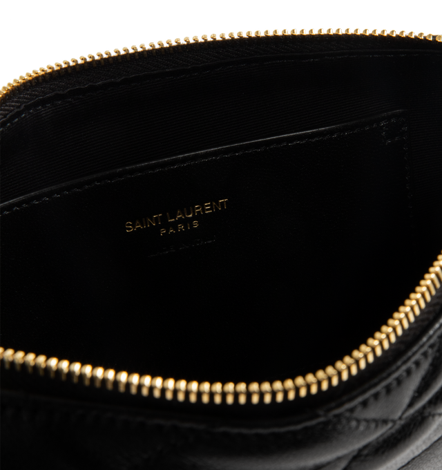 Image 2 of 2 - BLACK - SAINT LAURENT Bijou Pouch in lambskin featuring a CASSANDRE jewelry chain wrist strap, diamond quilting, cotton lining, bronze-tone hardware, one flat pocket and zip closure. 7.1" x 3.5" x 1.6". Handle drop: 6.7". Lambskin. Made in Italy.  