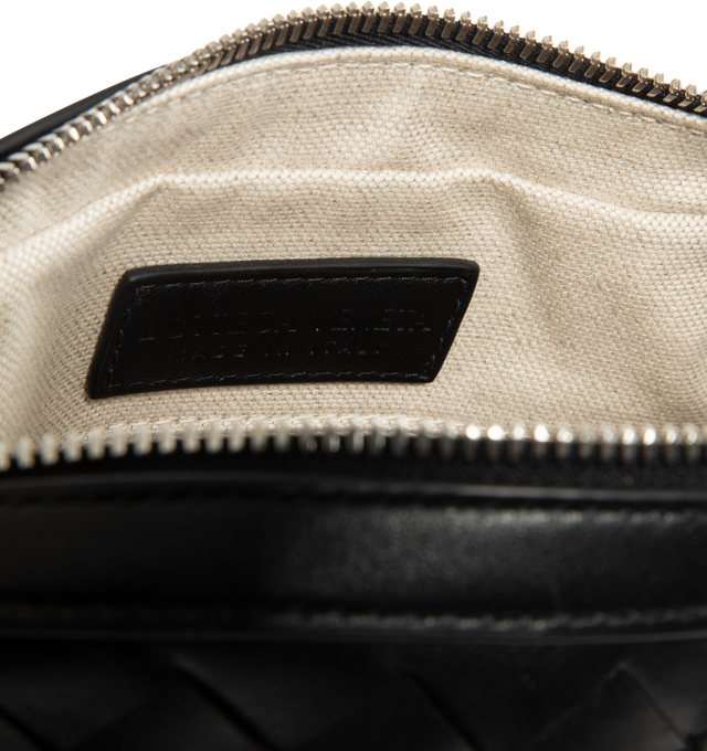 Image 3 of 3 - BLACK - BOTTEGA VENETA Intrecciato Messenger Bag featuring intrecciato leather small messenger with adjustable cross-body strap, zip closure and back exterior pocket. Calfskin. Lining: canvas. Made in Italy. 