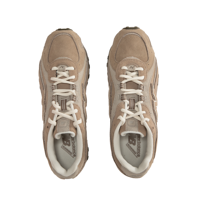 Image 5 of 5 - BROWN - New Balance 204L sneaker featuring a low-profile silhouette, slim structure of '70s running shoes, tech-inspired texture of premium suede, multi-piece upper with embossed overlay, double-stacked suede 'N' logo, and screen-printed graphics along the saddle. Distinctive outsole with 2000s-inspired strike path and 70s-influenced tread pattern. Outer: Calf Suede 100%, Lining: Fabric 100%, Sole: Polyethylene vinyl acetate (PEVA) 100%. Made in Vietnam. 
