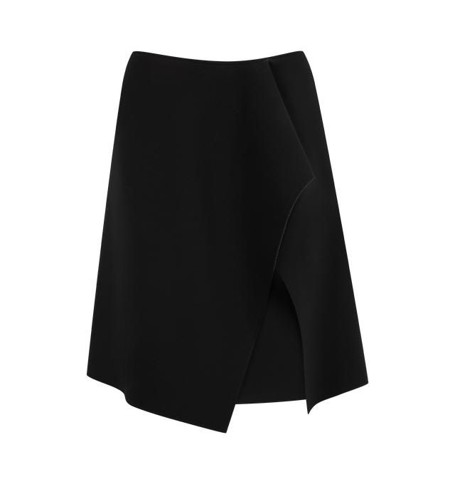 Image 1 of 3 - BLACK - Toteme Women's Sculptural Skirt is crafted from a viscose blend with a spongy texture and features a low-rise silhouette, a streamlined shape, and a high slit extending to the knee for ease of movement. Designed with side-seam pockets and a concealed back zip closure, this versatile style can be worn alone or layered over dresses, tights, or leggings. Main Material: 68% Viscose, 17% Wool, 15% Polyurethane.  