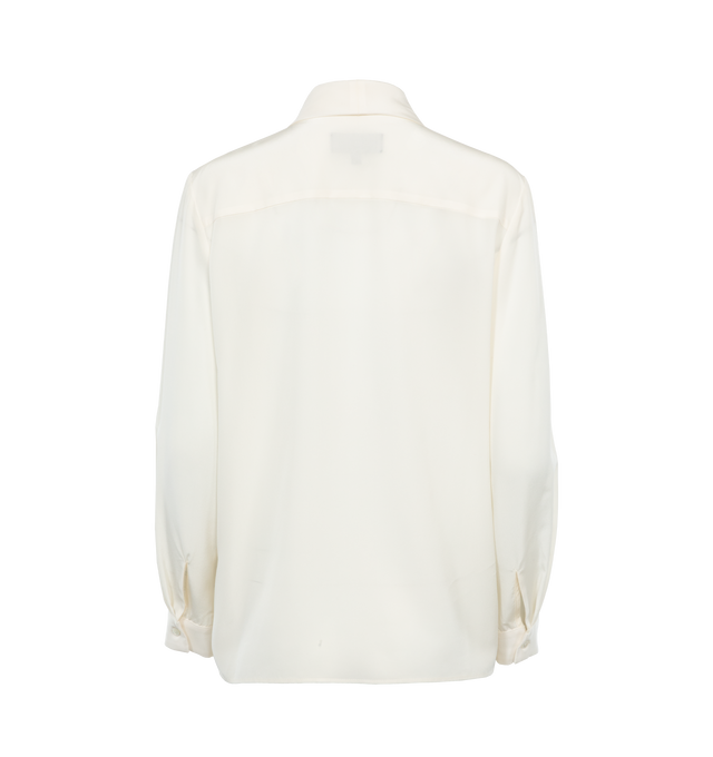 WHITE - NILI LOTAN ANGELIQUE TIE NECK BLOUSE featuring relaxed deep v, neck-tie blouse and exposed centerfront buttons. 100% silk. Made in USA.
