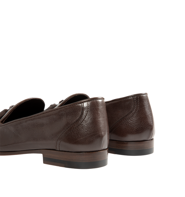 Image 3 of 4 - BROWN - The Row Women's Caden Loafers are crafted from softly grained calfskin leather in deep brown and feature an almond toe, tassel detailing, and a stacked heel. Upper: 100% Calfskin Leather. Sole: Calfskin Leather. Heel Height: 1.5 cm / 0.6 in. Made in Italy. 