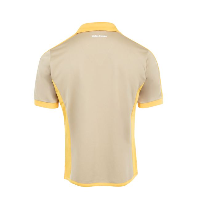 Image 2 of 2 - NEUTRAL - Wales Bonner Home Jersey Polo featuring colorblocked construction, spread collar, logo printed at chest and back collar and vented side seams. 100% polyester. Made in Portugal. 