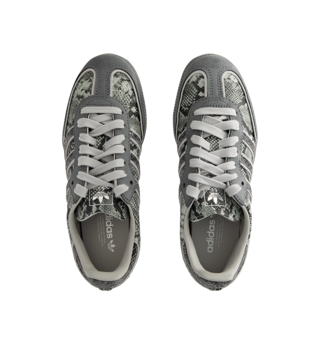 Image 5 of 5 - GREY - Adidas Men's Samba OG Snake-Effect Sneakers are crafted from calf leather. Features a snake-effect finish, round toe, lace-up closure, signature 3-Stripes, logo-print tongue, branded heel counter, and flat rubber sole. Upper: Calf Leather; Lining: Calf Leather; Sole: Rubber. Made in Vietnam. 