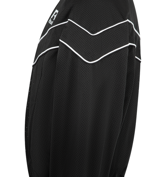 Image 3 of 3 - BLACK - RHUDE Mesh Poping Raglan Track Jacket featuring a cotton and polyester-blend taffeta, stand collar, versatile two-way zip closure, RHUDE logo is displayed on the chest, contrasting piping on front, sleeves, and back, welt pockets, elasticized hem and cuffs and fully lined. 100% polyester. 