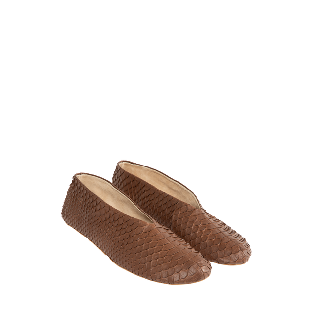 Image 2 of 4 - BROWN - The Row mousse brown slip-on flat with an oval toe, center front seam, and a flexible rubber-coated sole in textured python leather. Python leather with goat leather lining and rubber sole. Made in Italy. 