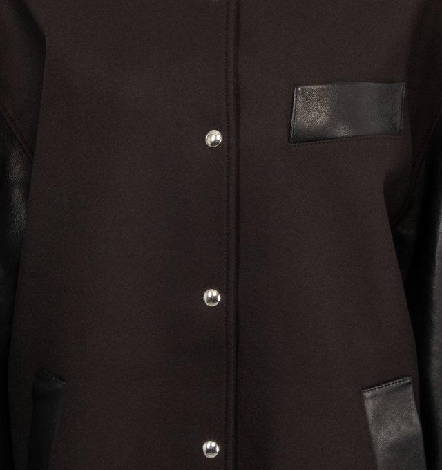 Image 3 of 5 - BROWN - KHAITE Spencer Jacket in Leather Combo featuring a varsity jacket topped by a ribbed collar reprised at the cuffs and hem. With pockets, chrome buttons, and signature elbow patches. 75% wool viscose, 25% polyamide. 100% leather. 