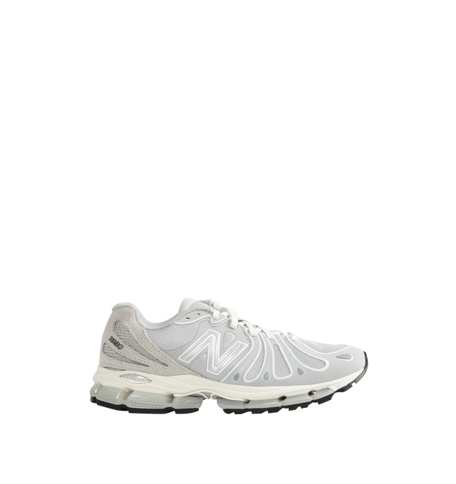 Image 1 of 5 - GREY - New Balance 1890 Unisex Sneakers feature a synthetic upper with a classic lace-up silhouette. Designed with ABZORB midsole cushioning for enhanced impact absorption, all-day comfort, and a durable rubber outsole. Upper: Synthetic; Midsole: ABZORB.  