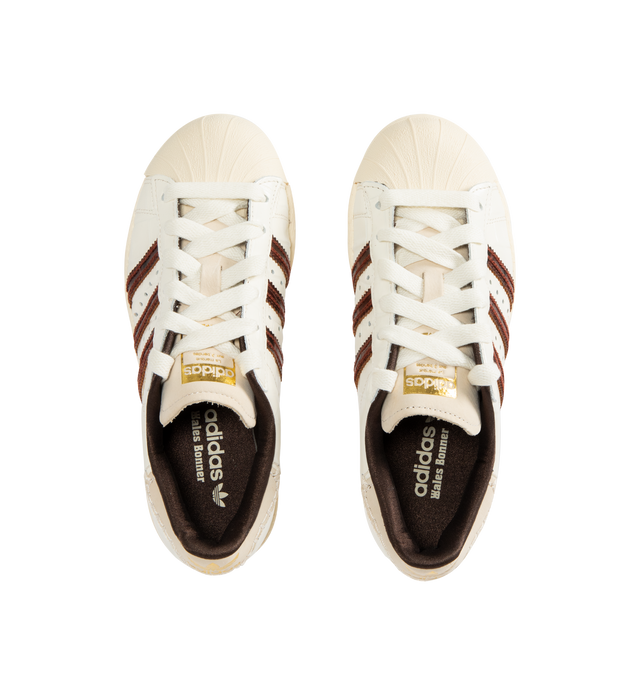 Image 5 of 5 - WHITE - ADIDAS X WALES BONNER Superstar Sneaker featuring leather upper, croc-embossed finish, contrast logo accents, removable insole, textile lining, lace-up closure, round toe and rubber sole. 