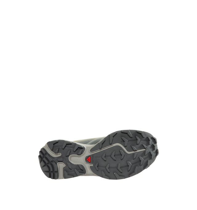 Image 4 of 5 - GREY - Salomon Unisex XT-EVO Sneakers are built with a synthetic and textile upper and are made to be a performance-driven combining stability and cushioning for lasting comfort. Additional details include Quicklace one-pull lacing, endoFit internal sleeve construction, sensiFIT support, seamless construction, and a lace pocket for streamlined wear. A molded OrthoLite sockliner and Mud ContaGRIP rubber outsole enhance cushioning, durability, and traction across varied terrain. Upper: Syntheti 