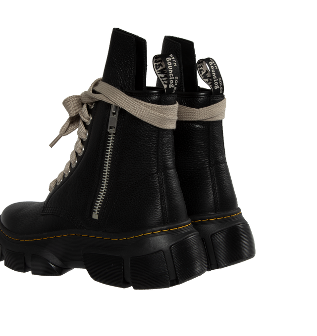 Image 3 of 4 - BLACK - DR. MARTENS X RICK OWENS 1460 DXML boot in black cow leather featuring exaggerated length pearl-tone laces and palladium finish hardware including eyelets  and side zipper, an extended geometric tounge and woven Dr. Martens Airware heel loop. 50% E.V.A + 50% Polivinilclorurol rubber sole with Dr. Martens yellow welt stitch. DXML outsole, an exaggerated interperetation of the classic Dr. Martens sole.  
