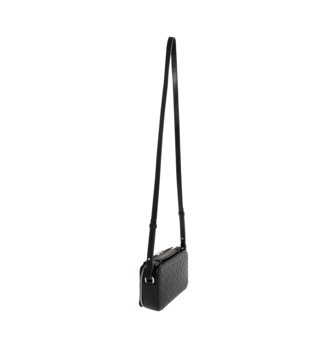 Image 2 of 3 - BLACK - BOTTEGA VENETA Crossbody Bag featuring Intrecciato leather, single compartment, zip closure, silver hardware and crossbody strap. Calfskin. Made in Italy.  