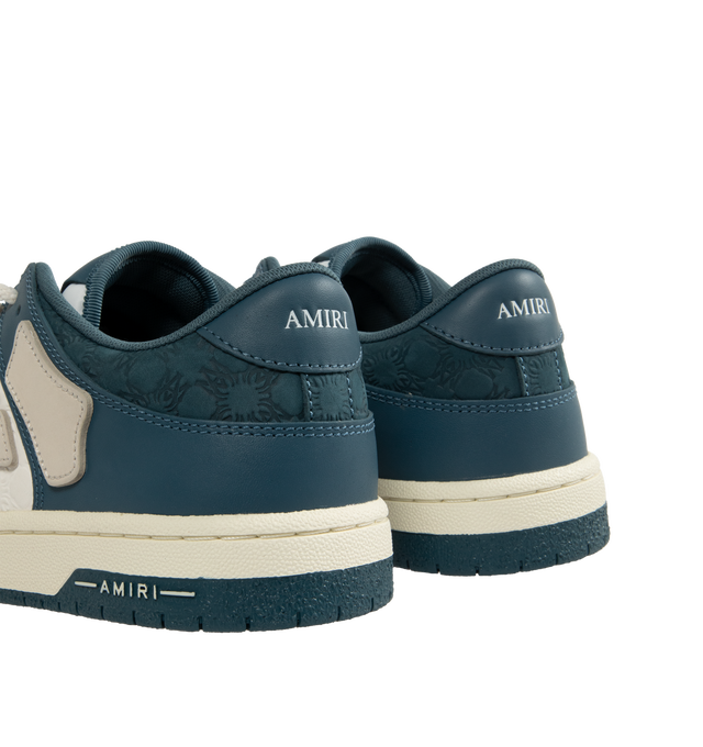 Image 3 of 5 - BLUE - Amiri Men's Quad Skel Top Low Sneakers are a lace-up style with perforation details, signature graphics, leather appliques, and two-tone rubber soles. Leather uppers. Made in Vietnam. 