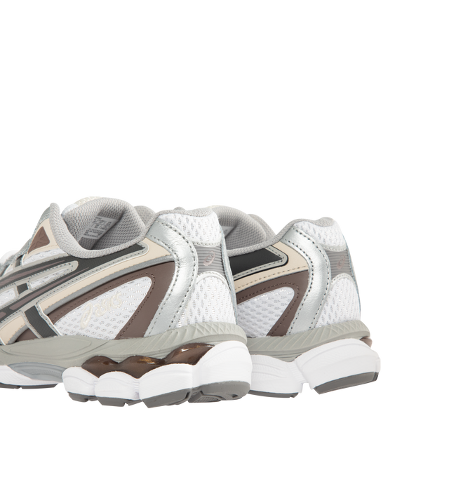 Image 3 of 5 - MULTI - ASICS GEL-NYC 2055 Sportstyle sneaker with early 2000s running shoe design influences in the upper's ASICS stripes, heel counter, and eyelet structure. Featuring GEL-CUMULUS 16 shoe's tooling system. Through a combination of lightweight foams and GEL technology inserts, this midsole formation helps create advanced underfoot comfort. Unisex style in men's sizing. Imported from Cambodia. 