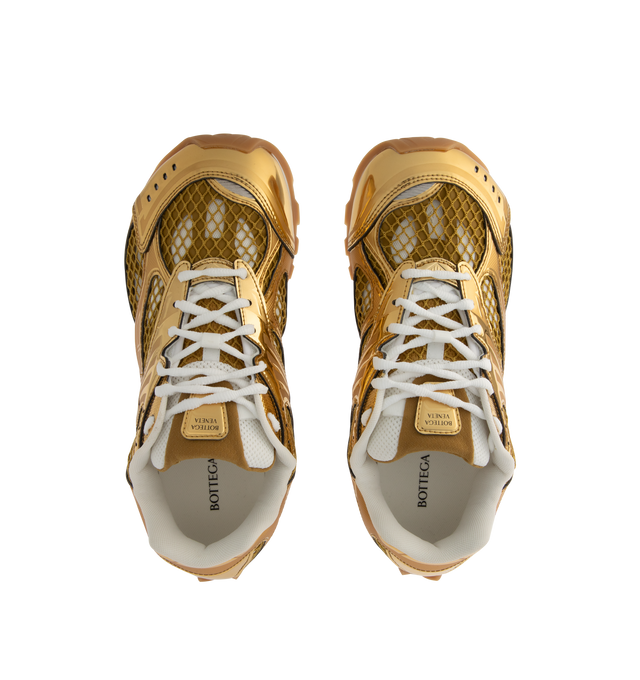 Image 5 of 5 - GOLD - BOTTEGA VENETA Sneakers featuring mechanical textile upper, rubber sole, lace-up front, padded collar and tongue with Bottega Venneta logo detail at tongue. Made in Italy. 