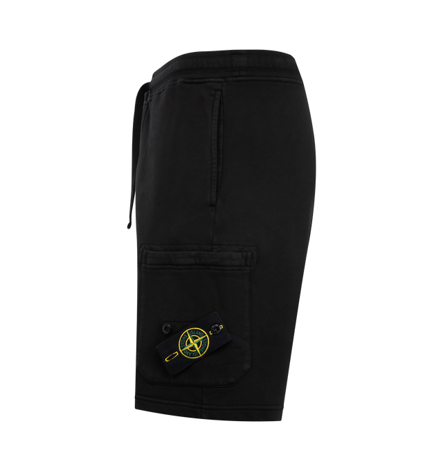 Image 3 of 3 - BLACK - STONE ISLAND Shorts featuring standing hand pockets, one pocket on back with fixed flap and hidden snap, patch pocket on left leg with hidden zipper and Stone Island badge, elasticated waistband with drawstring, zipper fly, overlock seams and regular fit. 100% cotton. 