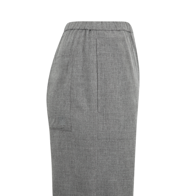 Image 3 of 3 - GREY - TOTEME Fluid Winter Trousers featuring elasticated waistband, a high waist with side and back pockets and flared, wide legs for a sculptural effect. 90% viscose, 10% wool. 