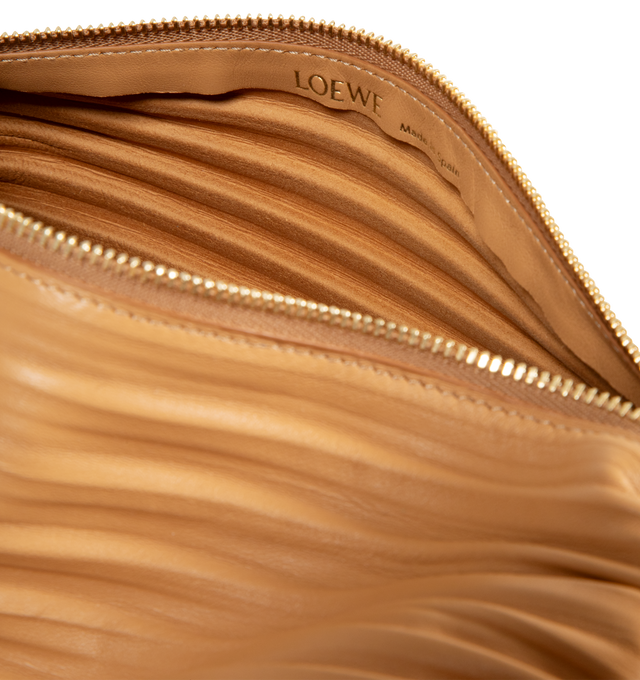 Image 3 of 4 - BROWN - LOEWE Bracelet Pouch in pleated nappa lambskin featuring a tubular bag that converts into a bracelet, finished with embossed plaques on each end, detachable and adjustable strap, zip closure with tonal pull, unlined and engraved Anagram. Pleated nappa. 10 cm x 25 cm x 10 cm. Made in Spain. 