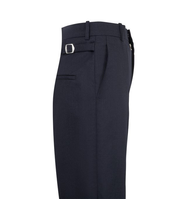 Image 3 of 3 - NAVY - Bottega Veneta Women's Trousers are crafted from Shetland wool and feature a tailored straight-leg silhouette. Designed with a mid-rise waist, belt loops, adjustable hip straps, and a zip, hook-and-eye closure, they are finished with slanted side pockets, rear welt pockets, and a center back vent. Main Material: 100% Wool. Lining: 100% Cotton. Color: Midnight Blue. Made in Italy. 