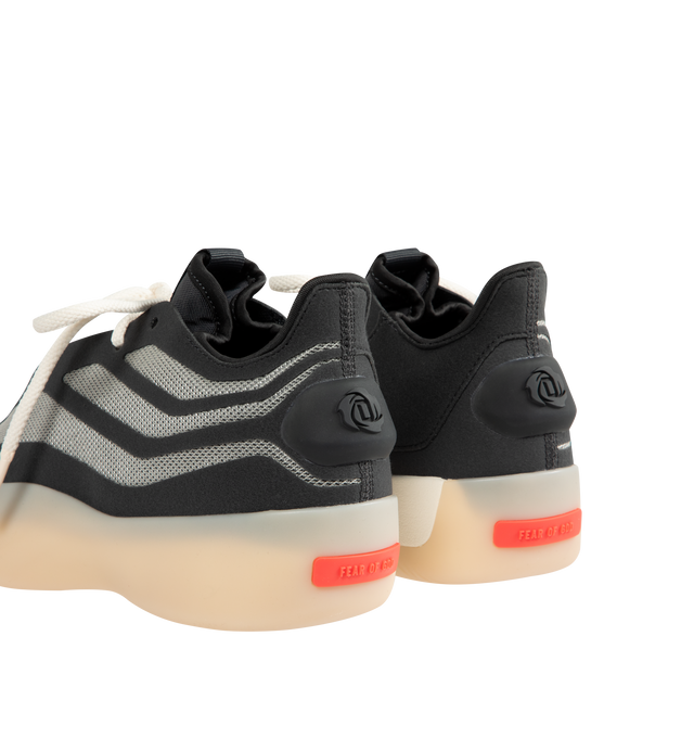 Image 3 of 5 - BLACK - ADIDAS Fear of God Athletics II Basketball Sneaker featuring synthetic upper, monofilament stripe panels, adidas branded TPU heel spoiler, TPU shank for spring and propulsion, lightstrike midsole, semi-translucent rubber outsole, adidas logo embossed on toe and Fear of God logo on black bar. 