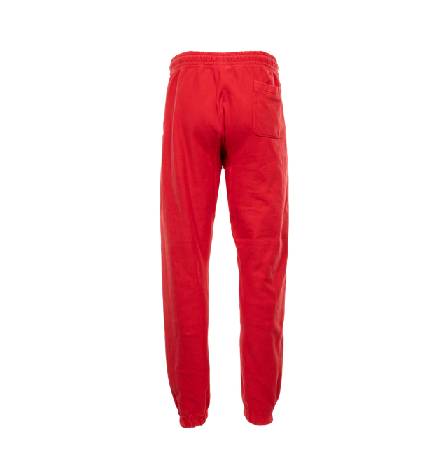 Image 2 of 5 - RED - SAINT MICHAEL Sweat Pants featuring elastic waist with drawstrings, side pockets and back pocket, logo on leg, no side seam and elastic hem. 100% cotton. 