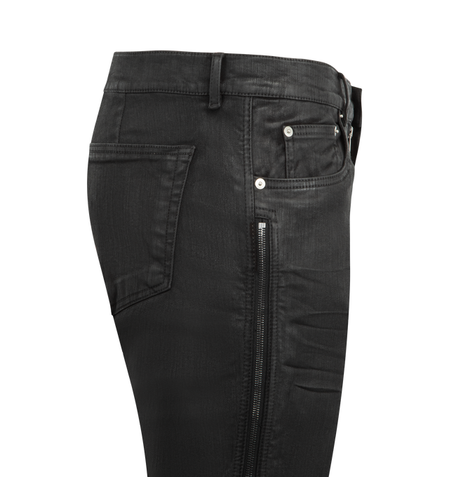 Image 3 of 3 - BLACK - RICK OWENS Vega Jeans featuring coated stretch denim jeans, belt loops, six-pocket styling, zip fly and zip vent at outseams. 91% cotton, 6% elastomultiester, 3% rubber fiber. Made in Italy. 