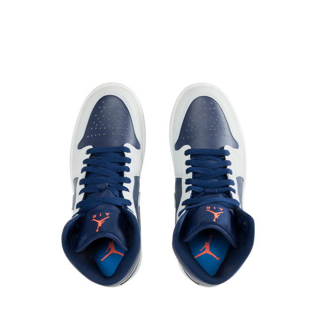 Image 5 of 5 - NAVY - JORDAN Air Jordan 1 Mid Sneaker featuring mid-top, leather, synthetic leather, textile upper, foam midsole, Nike Air cushioning and rubber outsole with pivot circle. 