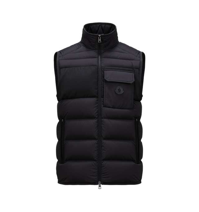 BLACK - MONCLER Estagnous Vest featuring boudin and square quilting, tonal twill chest panel, stand collar, two-way zip closure, chest flap pocket with tonal logo patch, side zip pockets and sleeveless. Nylon/polyamide/virgin wool. Goose down/feather fill. Lining: nylon. Made in Romania. 