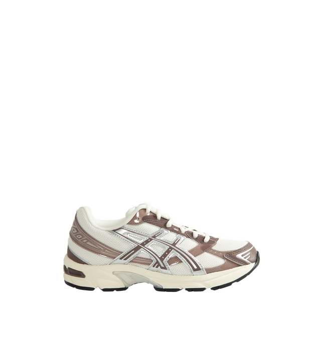 Image 1 of 5 - NEUTRAL - Asics Unisex Gel-1130 Sneakers feature patent leather overlays, clear gloss TPU accents, and breathable mesh underlays for a modern look. Enhanced with cushioning and support designed for all-day comfort, the GEL-1130 delivers the perfect blend of heritage performance and everyday wearability. Main Material: Mesh Upper with Patent Leather and Gloss TPU Overlays. Cushioning: GEL Technology. Details: GEL-1000 Series Heritage Design, Breathable Mesh Construction *Unisex style in men's  