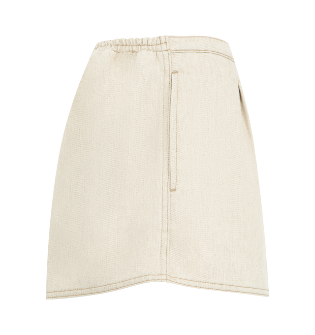 Image 3 of 3 - NEUTRAL - JACQUEMUS Amelo de-Nmes Denim Shorts featuring denim pleated shorts, mid rise, hemp denim, embroidered patch on the front waistband, stitched pleats, faux fly, embroidered J on the leg, integrated tied belt in the back and elasticated waistband in the back. 80% cotton, 20% hemp. Lining: 65% polyester, 35% cotton. Made in Italy. 