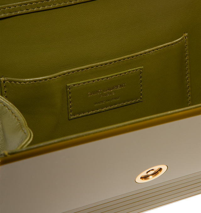 Image 3 of 3 - GREEN - SAINT LAURENT Vicky Minaudiere Bag in Plexiglass featuring a front flap decorated with the iconic CASSANDRE, a curb-chain strap for shoulder carry, leather lining, bronze-tone hardware, magnetic snap closure and one flat pocket. 18.5" x 5.3" x 1.6". Plexiglas. Made in Italy. 
