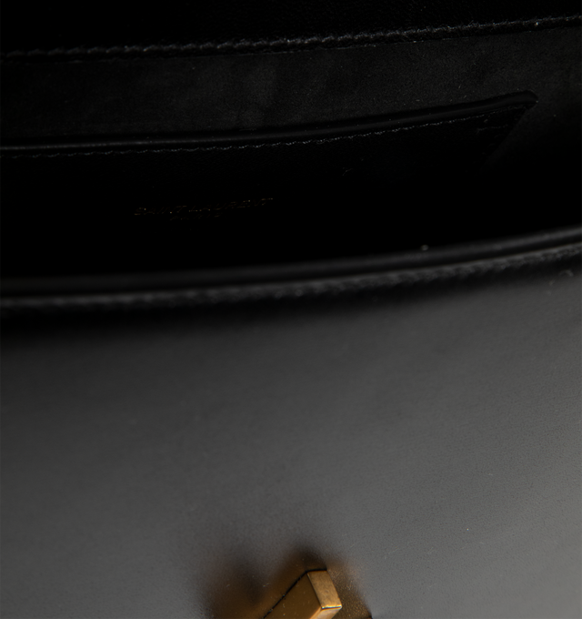 Image 3 of 3 - BLACK - SAINT LAURENT Solferino Medium Bag in box leather with a cassandre closure, fully lined in leather, rounded lines, adjustable strap for shoulder wear, suede lining, bronze-toned hardware and sliding clasp closure. 9.6" x 5.9" x 3.3". Strap drop: 8". Lambskin. Made in Italy. 
