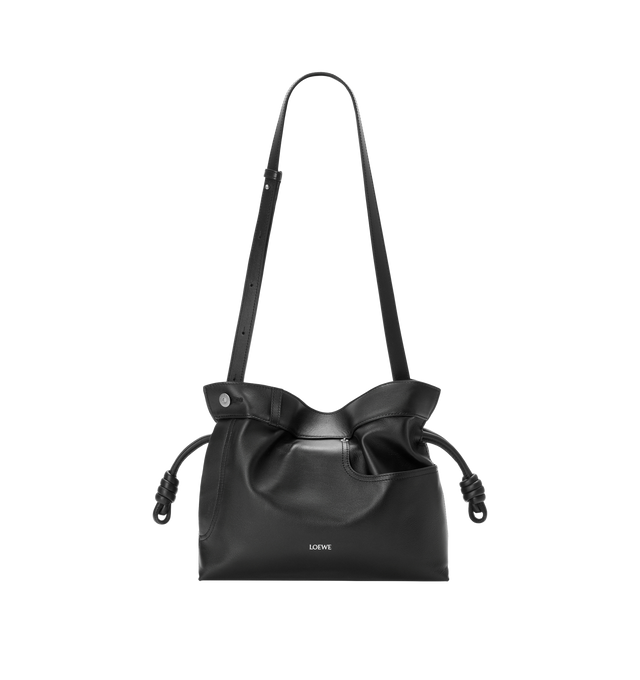 Image 3 of 4 - BLACK - LOEWE Panta Flamenco Medium Clutch in shiny calfskin featuring a soft and slouchy bag with a cinched closure and historical knot drawstrings. This medium version is crafted in shiny calfskin with denim trousers-inspired details, shoulder, crossbody or hand carry, detachable and adjustable strap, magnetic closure, herringbone cotton canvas lining and silver embossed LOEWE. Shiny calf. 24.5 cm x 30 cm x 10.5 cm. Made in Spain. 