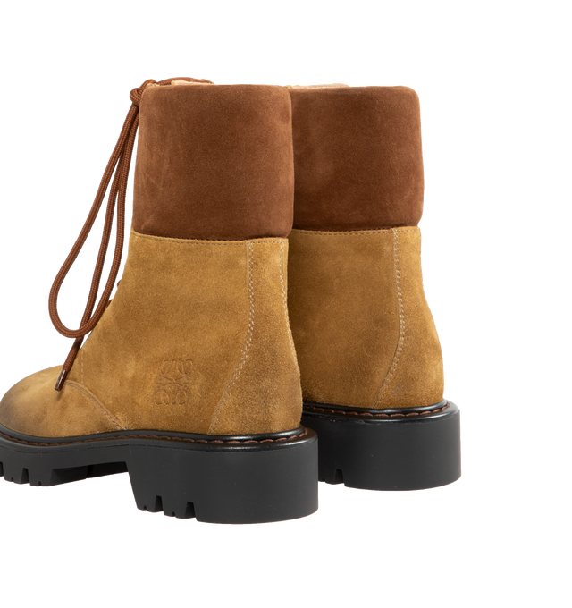 Image 3 of 4 - BROWN - Loewe Lace-up boot in waxed suede featuring a bulky toe shape, suede collar, thick rubber lug sole, contrast stitching, with embossed Anagram on the side. Comes with both a short and long pair of laces. Waxed Split Calf leather.  Made in : Italy. 