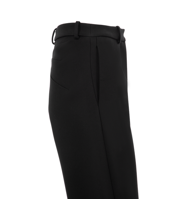 Image 3 of 3 - BLACK - ALAA Wool gabardine barrel-leg pants featuring a curved cut, high waist, zipper, and belt loops. Made in Italy. 98% VIRGIN WOOL, 2% ELASTANE. 