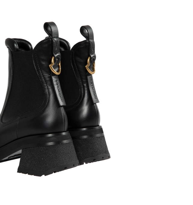 Image 3 of 4 - BLACK - MONCLER Gigi Chelsea Boots featuring a flared heel, logo outline-shaped hardware, leather upper, leather insole, leather-covered welt, l eather-covered heel, micro rubber midsole and rubber tread. Sole height 7 cm. 70% polyester, 30% elastodiene. Leather. Made in Italy. 