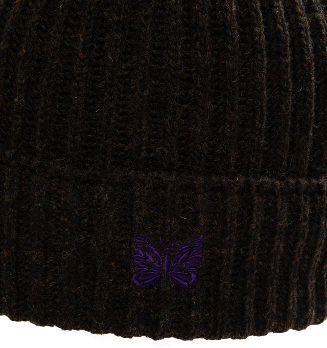 Image 3 of 3 - BROWN - Needles Watch Cap is crafted from Shetland wool and features a classic watch cap silhouette with the brand's signature embroidered Papillon motif at the front. Designed for warmth and everyday wear, the soft yet durable knit benefits from the natural insulating properties of Shetland wool, which helps retain heat while remaining comfortable. Main Material: 100% Wool. Made in Japan. 
